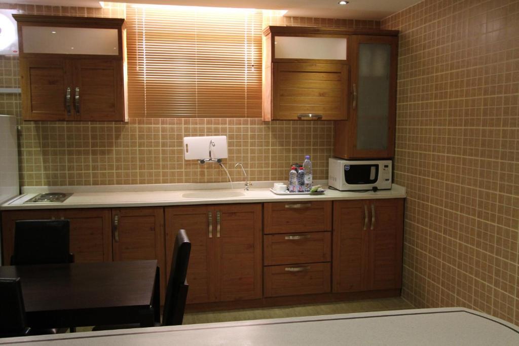 Manazel Al Hamra Apartment 2 Бурайда Стая снимка